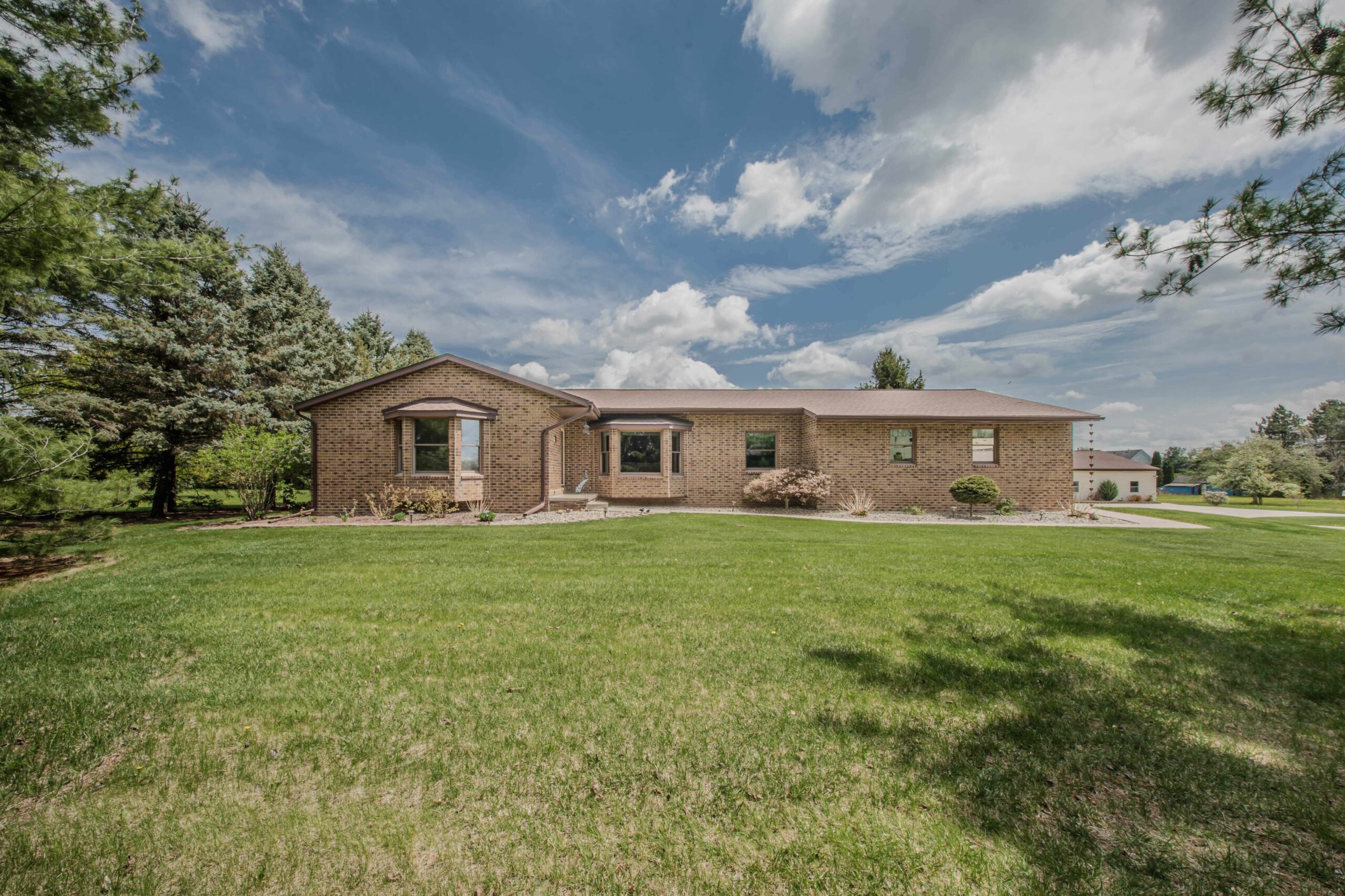 Exceptional Ranch Home Nestled on a Premier Saline Lot